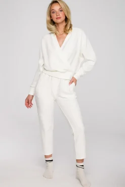 Bluza z kopertowym dekoltem - kremowa Bluzy