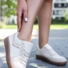 Sale Niskie trampki Yana - beżowo-złote Sneakersy