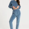 Online Welurowe spodnie dresowe z wypustką - niebieskie Odzież Casualowa|Spodnie